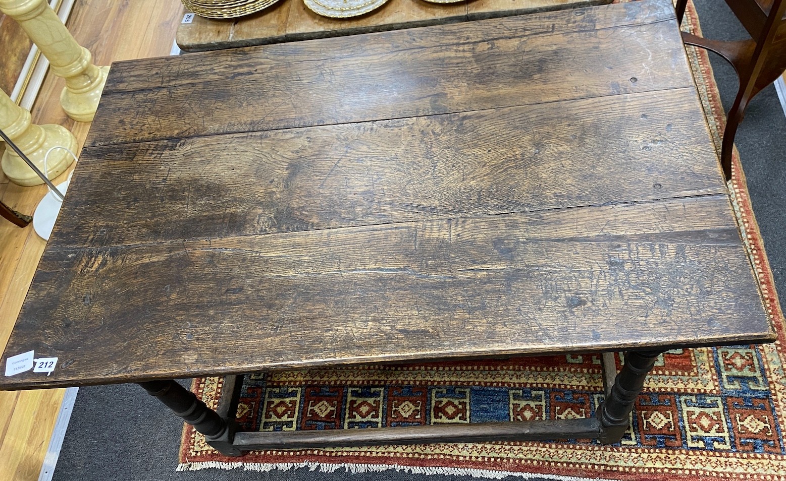 An early 18th century oak rectangular topped side table, width 111cm, depth 68cm, height 74cm